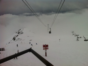 Waiting for the gondola above the clouds